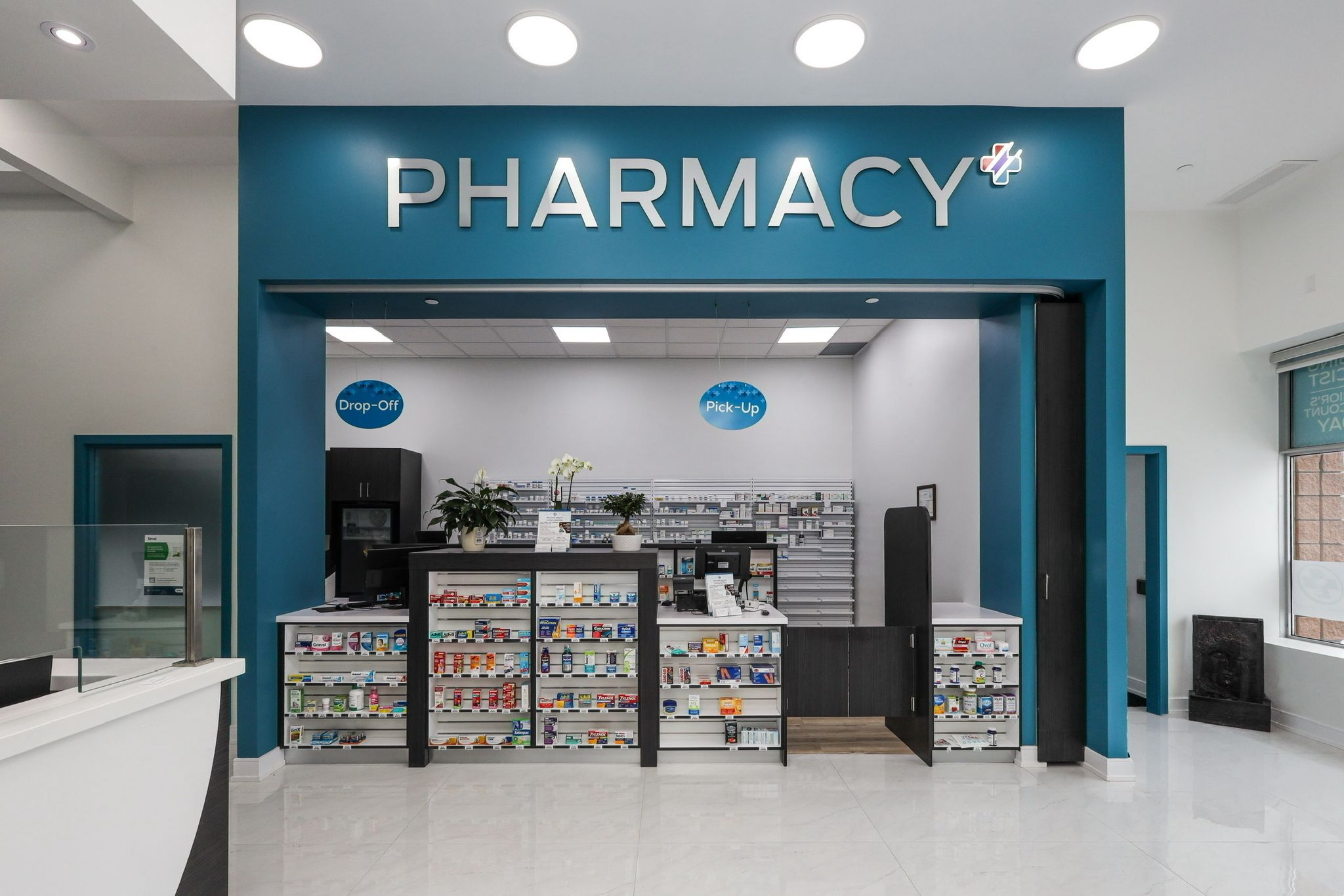 Bayview Health Pharmacy dispensary counter with Drop-Off and Pick-Up stations